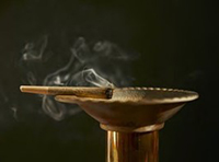burning cigar on ashtray