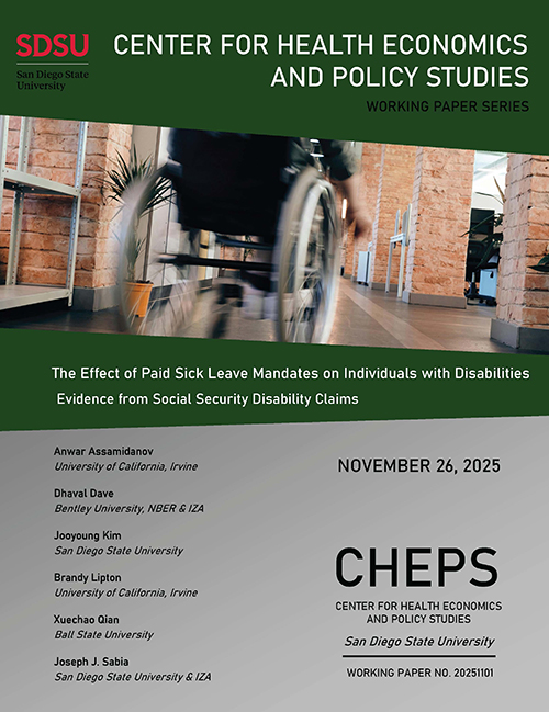 person in wheelchair goes down ramp